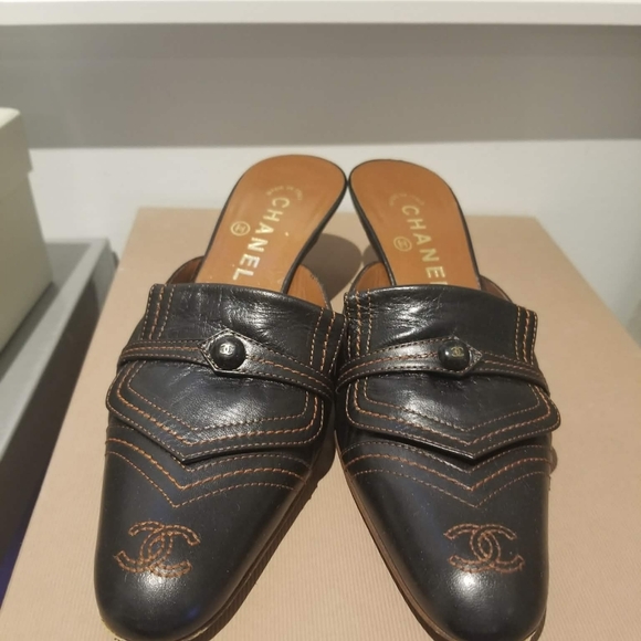 CHANEL Shoes - Chanel Black Leather Mules with Tan Stitching